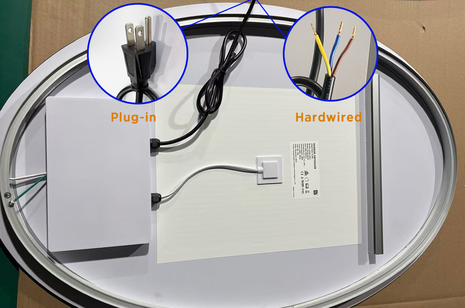 Rear wiring options for an LED bathroom mirror with plug-in and hardwired connections