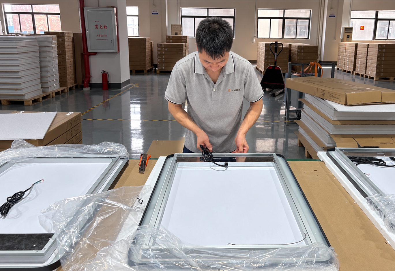 LED Mirror Final Packing Check STANHOM LED mirror reinforced packaging with PE bag EPE foam insert honeycomb paperboard and carton box