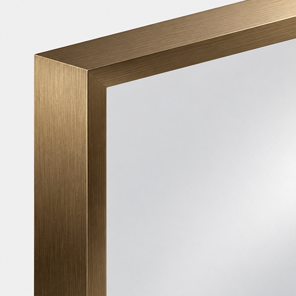 Bronze Framed Mirror – Brushed Metal Finish Detail Close-up of a bronze aluminium mirror frame corner showing a brushed metal texture and warm bronze finish