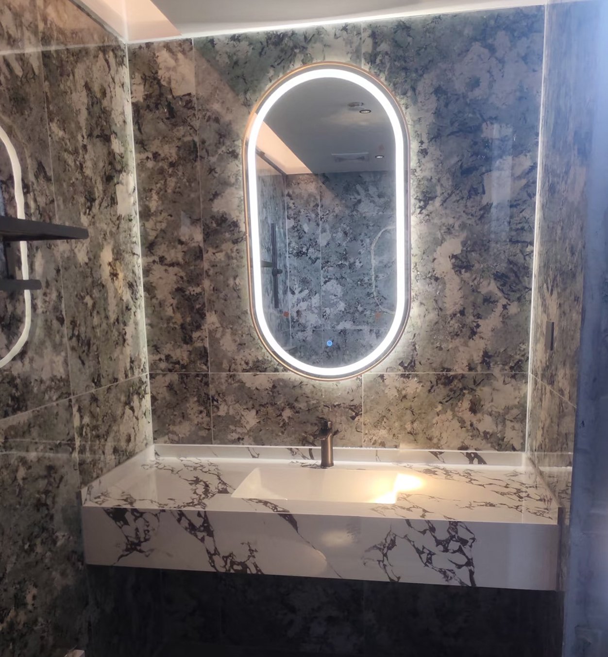 Middle East Gold Framed Front & Backlit LED Mirror Hotel Project Gold framed front and backlit LED mirrors installed for a hospitality bathroom project in the Middle East